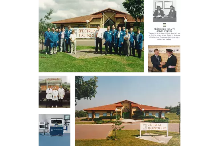 People standing in front of spectrum technology office